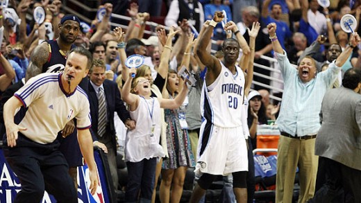 ORLANDO, FL - MAY 26:  Mickael Pietrus #20 of the Orlando Magic and fans celebrate their 116-114 victory over the Cleveland Cavaliers in Game Four of the Eastern Conference Finals during the 2009 NBA Playoffs at the Amway Arena on May 26, 2009 in Orlando, Florida. NOTE TO USER: User expressly acknowledges and agrees that, by downloading and or using this photograph, User is consenting to the terms and conditions of the Getty Images License Agreement.  (Photo by Elsa/Getty Images) *** Local Caption *** Mickael Pietrus;LeBron James