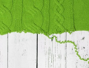 unraveling knitted woolen background