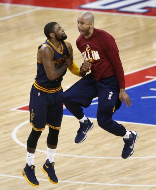  7 / 62 Cleveland Cavaliers guard Kyrie Irving celebrates with teammate Dahntay Jones after Irving sank a three point buzzer beater to end the third quarter. April 24, 2016. (Gus Chan / The Plain Dealer)